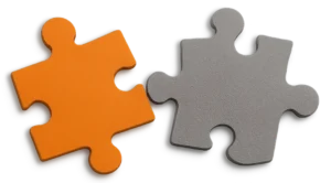 HR compliance puzzle pieces fitting together for complete workplace solutions.